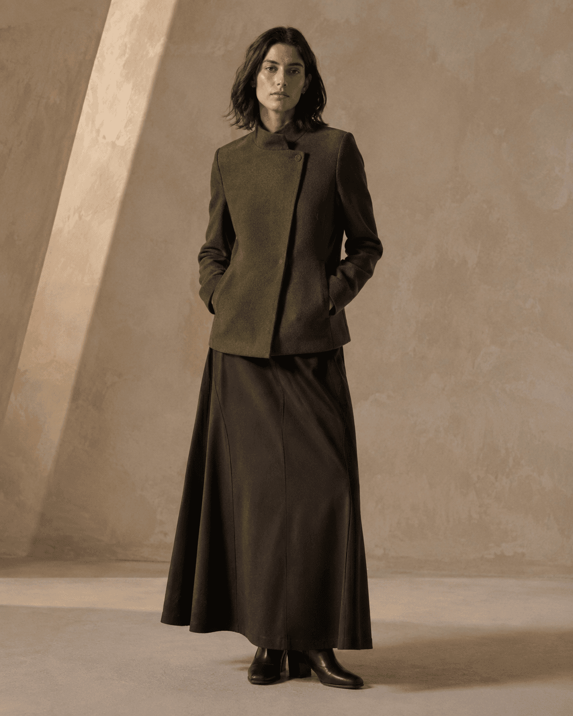 Olive wool jacket with a long dark skirt